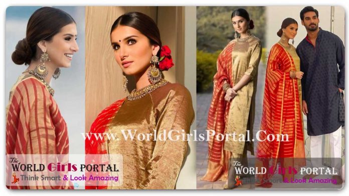 Tara Sutaria gold zari kurta set: The bronzed kurta perfectly fit her and she paired it with a red dupatta with gold work on the dupatta