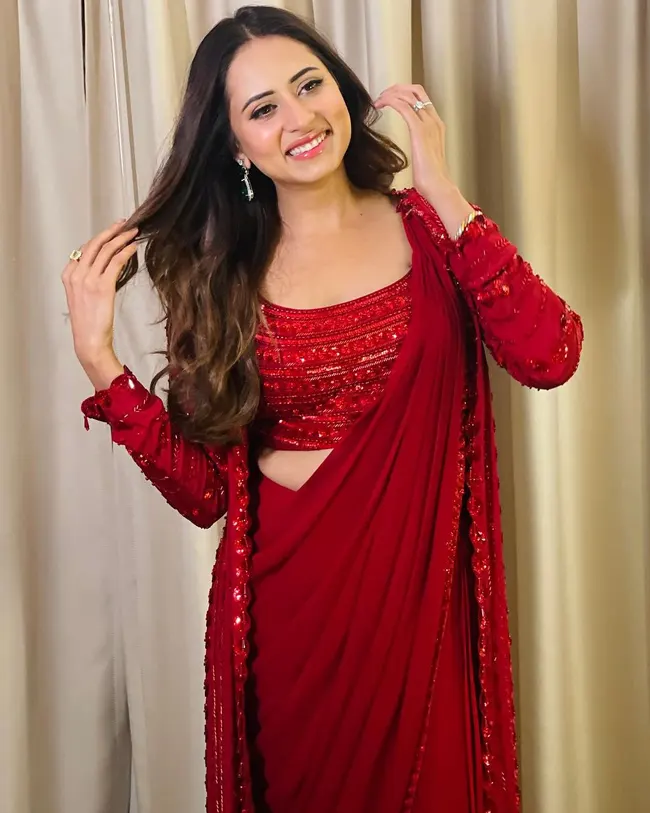 Sargun Mehta smiling at a film premiere event