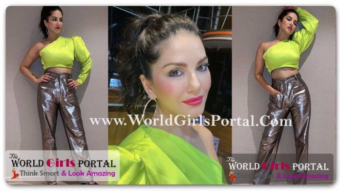 Sunny Leone Neon One-Shoulder Crop Top with Bling Silver Pants outfit - World Bollywood Portal
